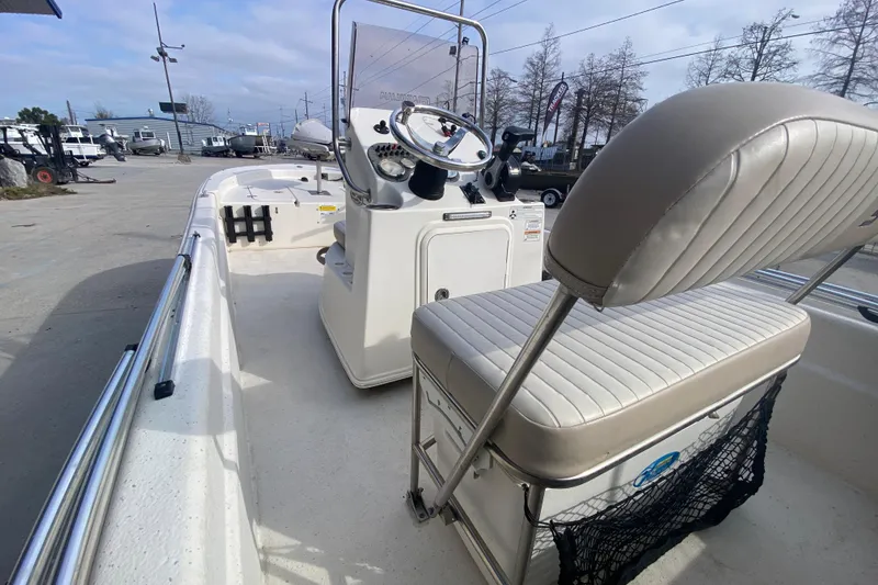 Slide: The Image of 2015 Carolina Skiff 20 JVX CC boat interior with steering console and seating. - 17