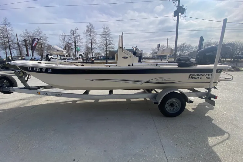 Slide: The Image of 2015 Carolina Skiff 20 JVX CC boat on trailer, side view. - 5