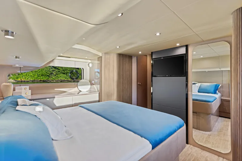Slide: The Image of Luxurious interior of 2026 Cruisers 50 Fly yacht with modern bedroom design. - 31