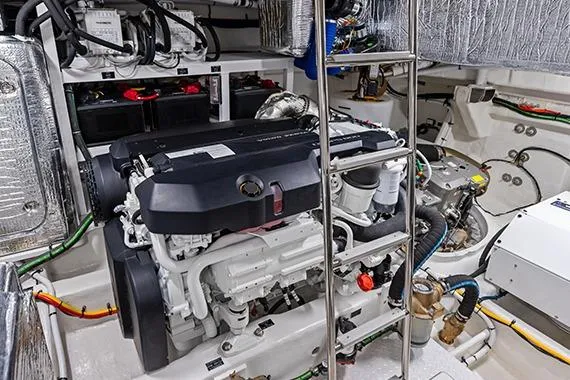 Slide: The Image of Engine room of 2026 Cruisers 50 Fly yacht, showcasing advanced machinery and components. - 42