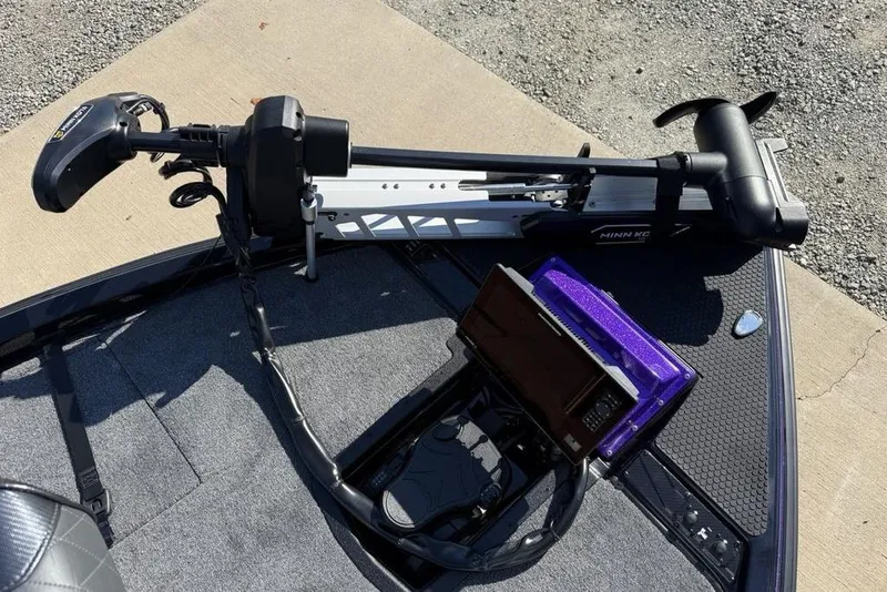 Slide: The Image of Phoenix 920 Elite X 2026 boat with Minn Kota trolling motor and fish finder. - 18