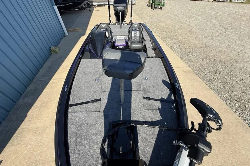 Slide: The Image of 2026 Phoenix 920 Elite X boat with spacious deck and modern seating. - 19