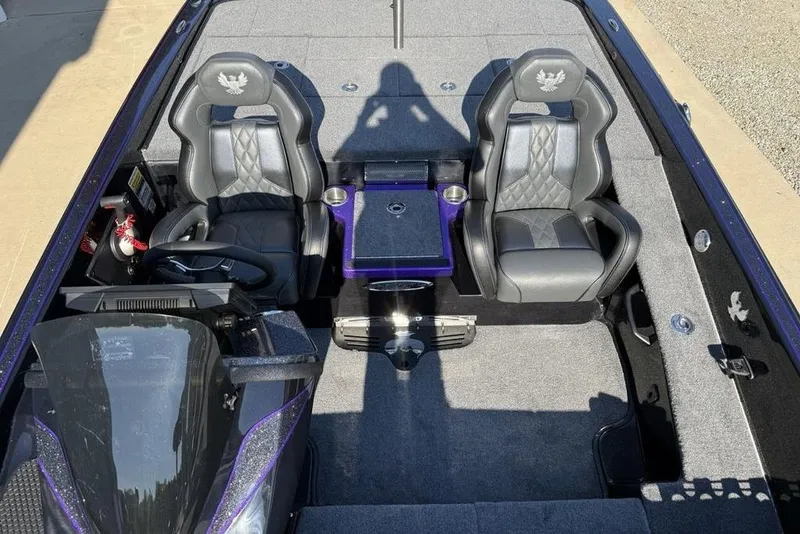 Slide: The Image of Interior of 2026 Phoenix 920 Elite X boat with dual seats and steering console. - 23