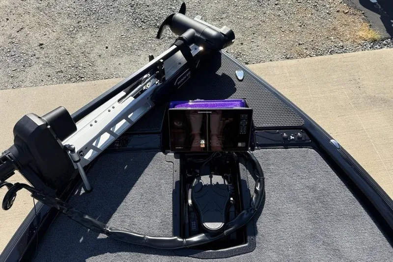 Slide: The Image of 2026 Phoenix 920 Elite X boat deck with advanced navigation system and trolling motor. - 4