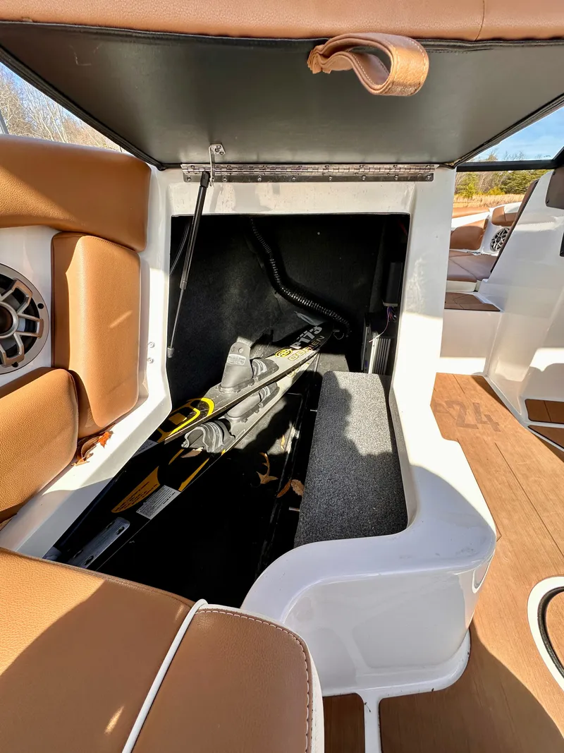 Slide: The Image of Storage compartment in 2023 Axis Wake Research A24 boat. - 15