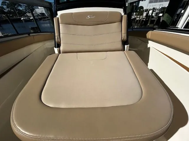 Slide: The Image of Luxurious seating area on a 2022 Scout 305 LXF boat. - 14
