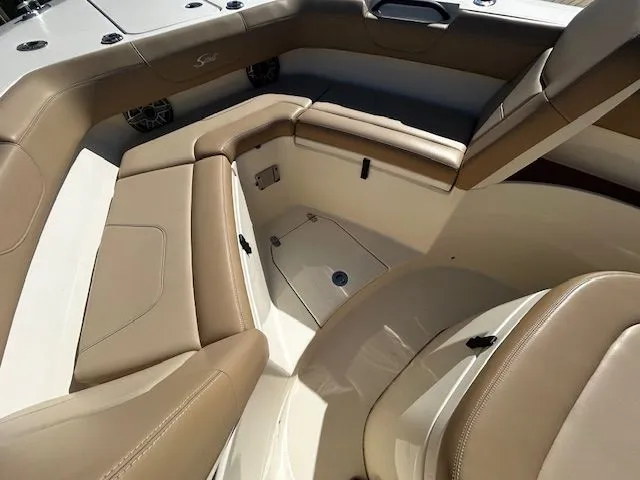 Slide: The Image of Interior of 2022 Scout 305 LXF with beige leather seating. - 22