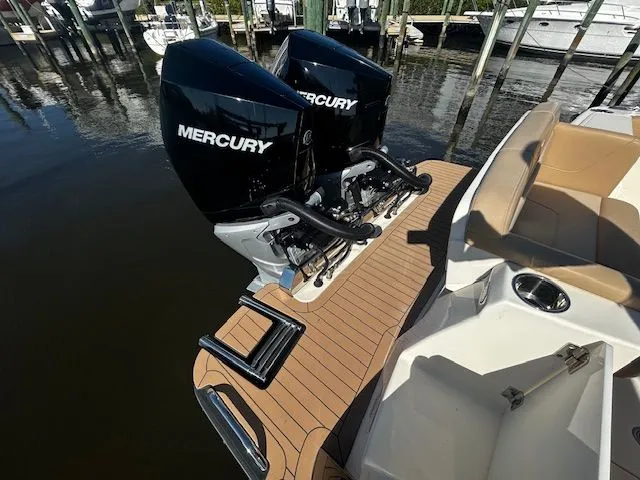 Slide: The Image of Scout 305 LXF 2022 with Mercury engines at dock. - 30