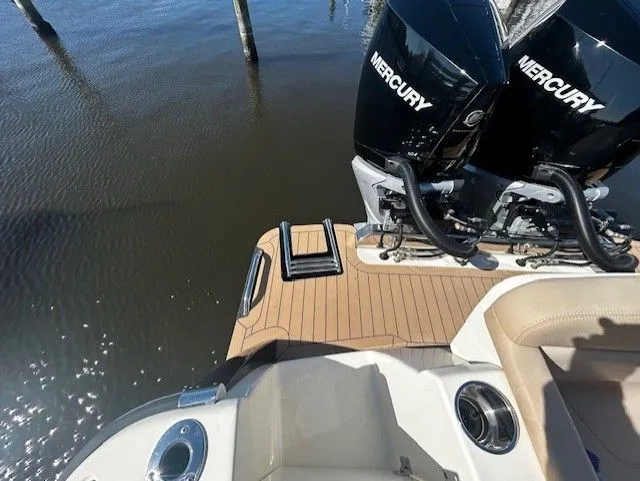 Slide: The Image of Scout 305 LXF 2022 with Mercury engines on water. - 31