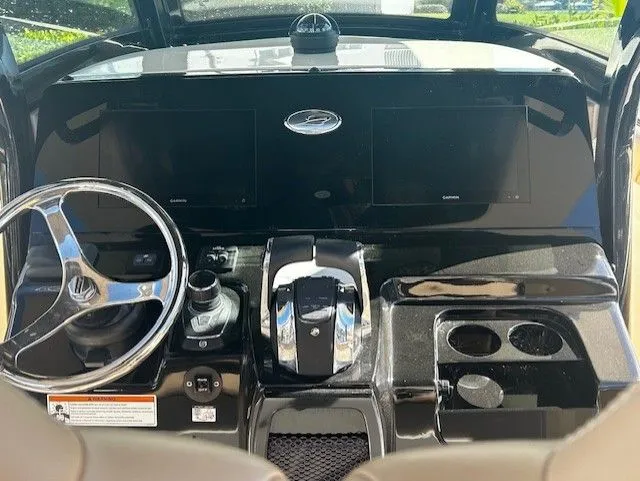Slide: The Image of Dashboard of 2022 Scout 305 LXF boat with steering and controls. - 37