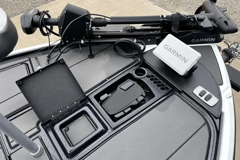 Slide: The Image of 2026 Nitro Z19 XL Pro boat deck with Garmin equipment and storage compartments. - 13