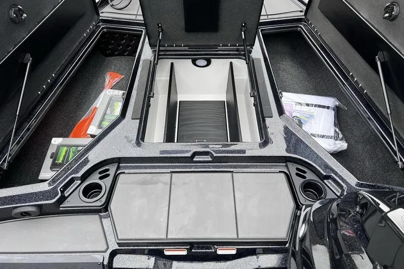 Slide: The Image of 2026 Nitro Z19 XL Pro boat storage compartments with accessories and organized layout. - 17