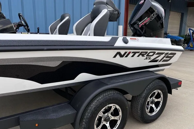 Slide: The Image of 2026 Nitro Z19 XL Pro boat with sleek design and Mercury Pro XS engine. - 9