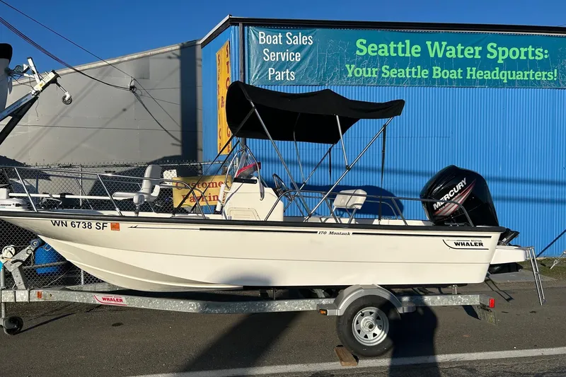 The Image of 2015 Boston Whaler 170 Montauk boat on trailer at Seattle Water Sports dealership. - 0