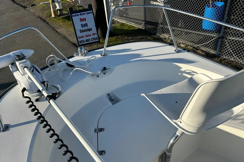 Slide: The Image of 2015 Boston Whaler 170 Montauk boat deck with seating and equipment. - 17