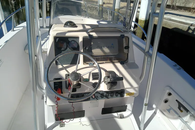 Slide: The Image of 1999 Grady-White Escape 209 boat console with Garmin navigation system. - 17