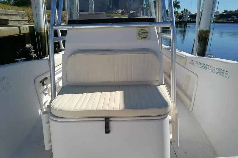 Slide: The Image of 1999 Grady-White Escape 209 boat interior with cushioned seating and stainless steel frame. - 20