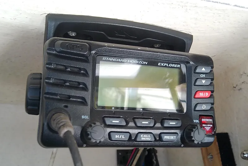 Slide: The Image of Standard Horizon Explorer radio on 1999 Grady-White Escape 209 boat. - 27