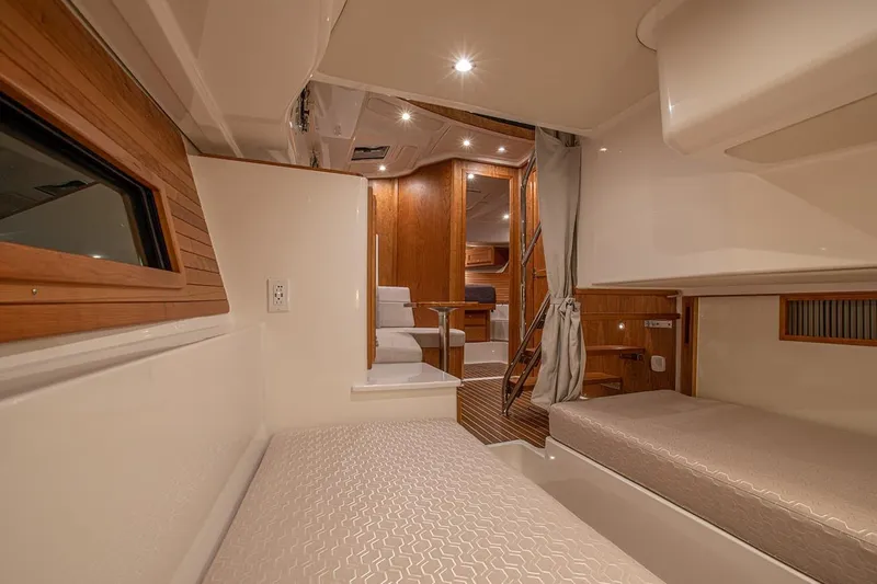 Slide: The Image of Manufacturer Provided Image: Luxurious interior of 2026 Back Cove 39O yacht with elegant wood finishes and cozy seating. - 10