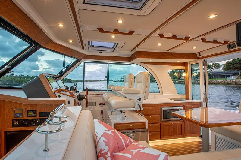 Slide: The Image of Manufacturer Provided Image: Luxurious interior of 2026 Back Cove 39O yacht with elegant seating and scenic water view. - 6