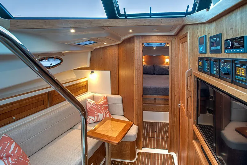 Slide: The Image of Manufacturer Provided Image: Luxurious interior of 2026 Back Cove 39O yacht with cozy seating and modern controls. - 8