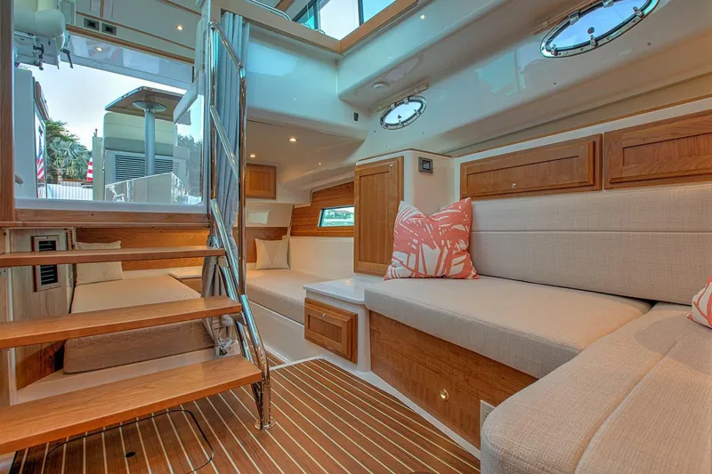 Slide: The Image of Manufacturer Provided Image: Luxurious interior of 2026 Back Cove 39O yacht with elegant wood finishes and cozy seating. - 9