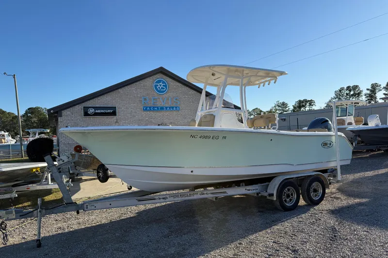 The Image of 2018 Sea Hunt Ultra 225 boat on trailer at Revis Yacht Sales. - 1