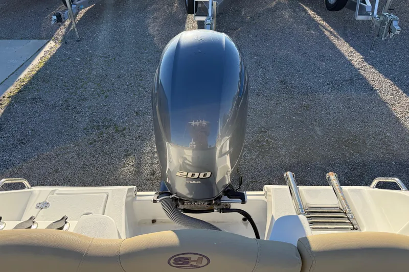 Slide: The Image of 2018 Sea Hunt Ultra 225 boat with Yamaha 200 outboard motor, rear view. - 16