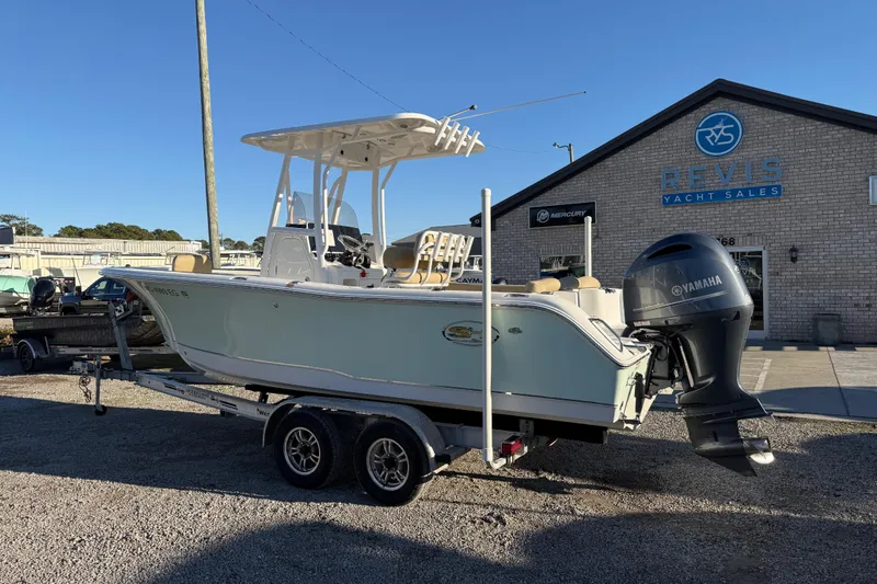 Slide: The Image of 2018 Sea Hunt Ultra 225 boat on trailer at Revis Yacht Sales. - 3