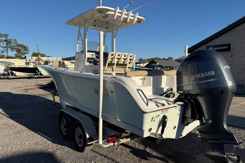 Slide: The Image of 2018 Sea Hunt Ultra 225 boat with Yamaha 200 engine on trailer. - 4
