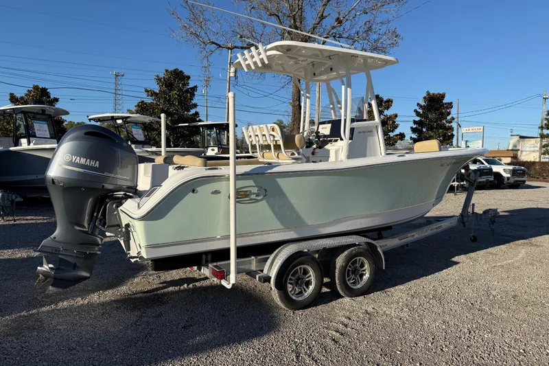 Slide: The Image of 2018 Sea Hunt Ultra 225 boat on trailer with Yamaha outboard motor. - 9