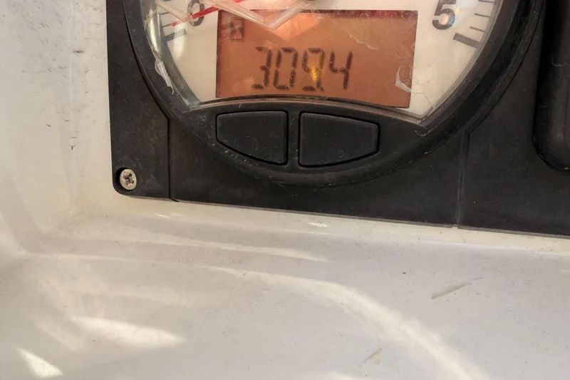 Slide: The Image of Close-up of Jeanneau Sun Odyssey 469 gauge displaying 3074 hours, 2014 model. - 100