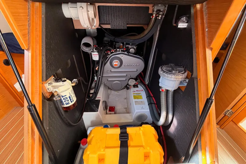 Slide: The Image of Engine compartment of 2014 Jeanneau Sun Odyssey 469 sailboat, featuring Yanmar engine. - 103