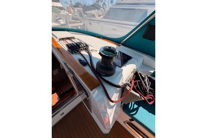 Slide: The Image of 2014 Jeanneau Sun Odyssey 469 sailboat deck with winch and ropes. - 45