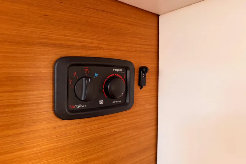 Slide: The Image of Control panel on Jeanneau Sun Odyssey 469 yacht, 2014 model, featuring Webasto Air Top Evo M. - 71