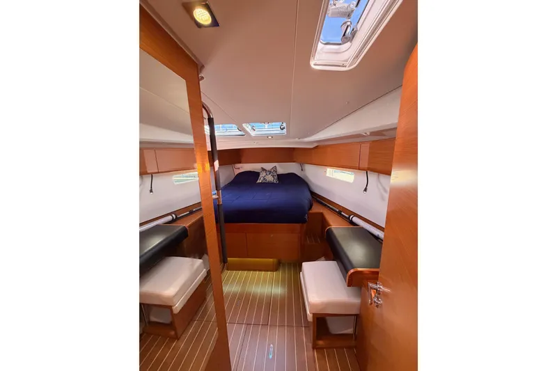 Slide: The Image of Luxurious cabin interior of 2014 Jeanneau Sun Odyssey 469 yacht with wood finish. - 82