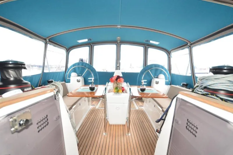 Slide: The Image of Mast of 2014 Jeanneau Sun Odyssey 469 sailboat against clear blue sky. - 9