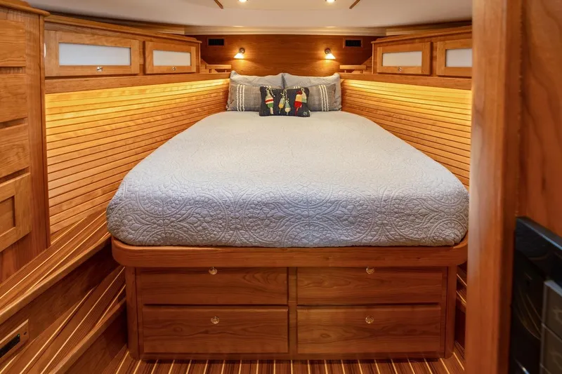 Slide: The Image of Luxurious interior of 2027 Sabre 51 Salon Express yacht with wooden cabinetry and sink. - 10