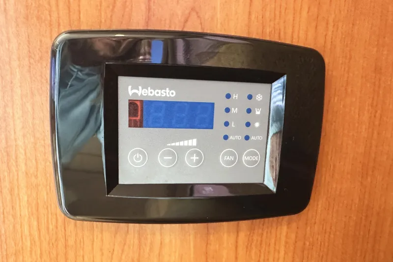 Slide: The Image of Webasto control panel on 2008 Silverton 36 Convertible yacht interior. - 35