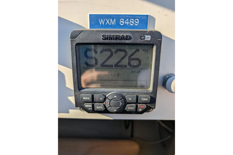 Slide: The Image of Simrad autopilot display on 1989 Blackman Billfisher 26 boat, showing heading S226. - 40