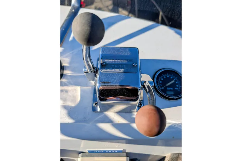 Slide: The Image of Close-up of 1989 Blackman Billfisher 26 boat controls and speedometer. - 47