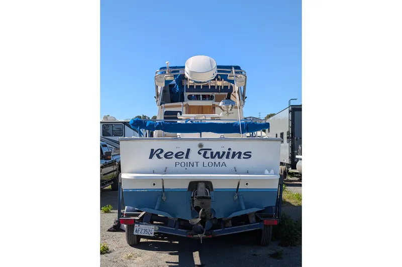Slide: The Image of 1989 Blackman Billfisher 26 boat named "Reel Twins" in Point Loma, rear view. - 8