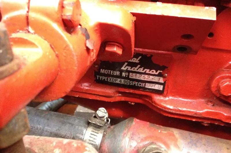 Slide: The Image of Close-up of a 1958 Atkins Sun Flower 22 engine with visible serial number plate. - 14