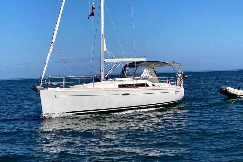 The Image of 2015 Beneteau Oceanis 37 sailboat on open sea. - 1