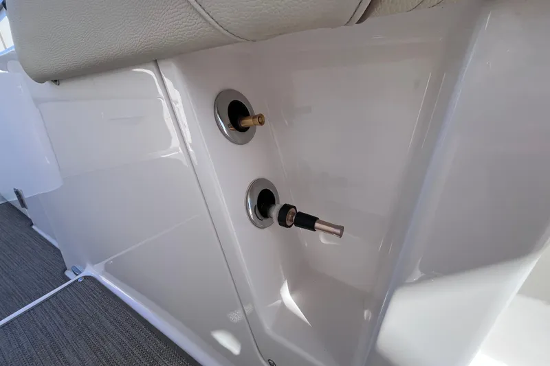 Slide: The Image of 2019 Regal 33 SAV boat interior detail with control knobs. - 46