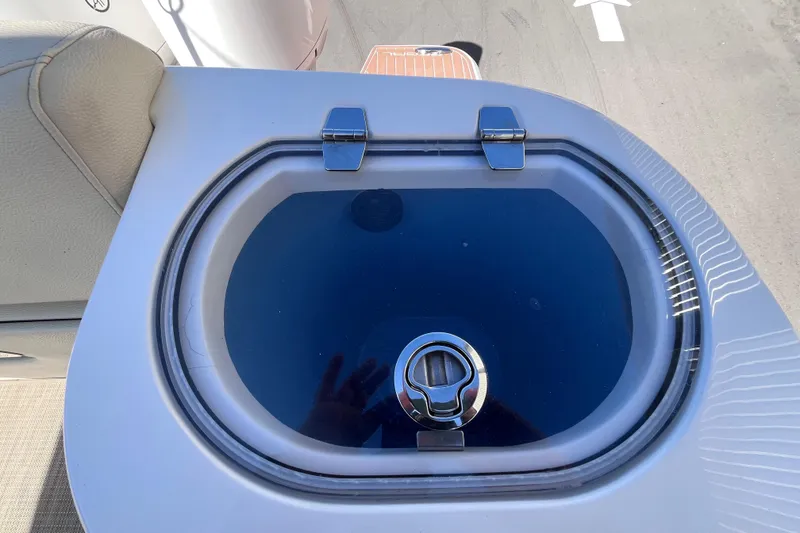 Slide: The Image of 2019 Regal 33 SAV boat sink with closed lid and chrome handle. - 61