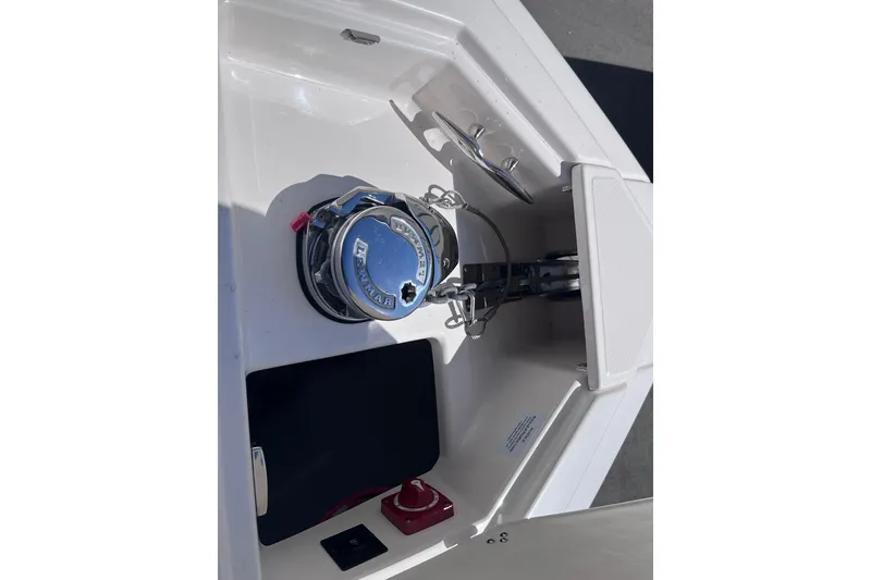 Slide: The Image of 2019 Regal 33 SAV boat anchor compartment with Lewmar windlass system. - 70