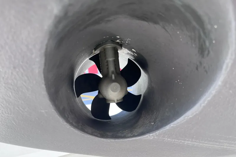 Slide: The Image of Close-up of a 2019 Regal 33 SAV boat's bow thruster propeller. - 91