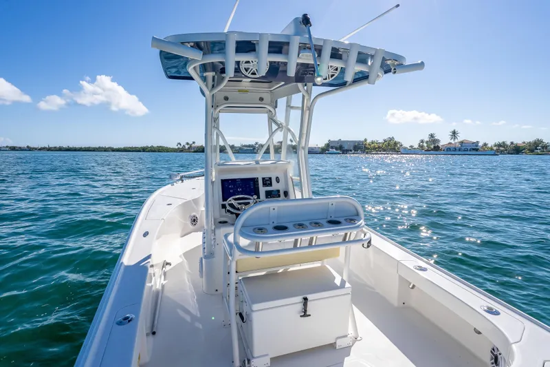 Slide: The Image of 2017 SeaVee 270Z boat on calm blue water under clear sky. - 11