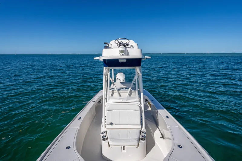 Slide: The Image of 2017 SeaVee 270Z boat on open ocean under clear blue sky. - 15